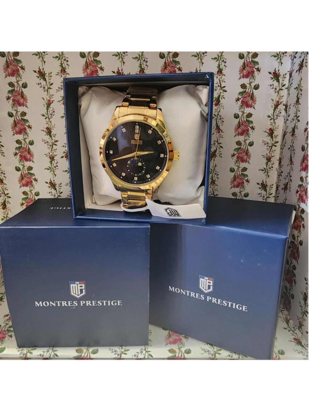 Montres Prestige gold watch with black dial and diamond accents #luxury #timepie